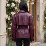 Women's Belted Faux Leather Short Trench Jacket in Purple Red – back on model