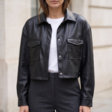 Black cropped faux leather shirt jacket — front lifestyle view