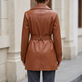 Brown belted faux leather coat — rear on model