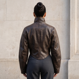 Corset-panel faux leather jacket — rear on model