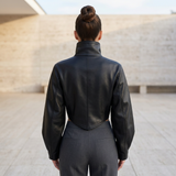Corset-panel faux leather jacket — rear on model