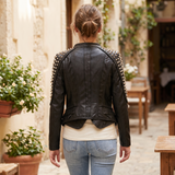 Women's Black Studded Faux Leather Jacket with Asymmetric Hem — Black — rear on model