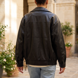 Women's Oversized Faux Leather Zip-Up Bomber Jacket — Black — rear on model