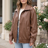 Women's Oversized Faux Leather Zip-Up Bomber Jacket — Light Brown — front on model