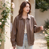 Women's Relaxed Faux Leather Bomber Jacket with Welt Pockets — Brown — alternate front view