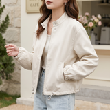 Women's Stand-Collar Faux Leather Bomber Jacket with Drawcord Hem — White — front on model