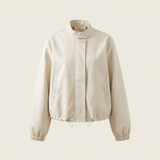 Women's Stand-Collar Faux Leather Bomber Jacket with Drawcord Hem — White — front product view