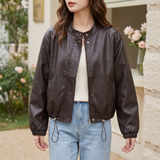 Women's Stand-Collar Faux Leather Bomber Jacket with Drawcord Hem — Brown — front on model